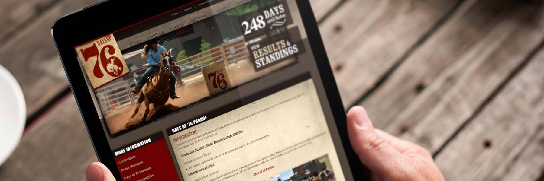 Days of 76 Rodeo website on tablet