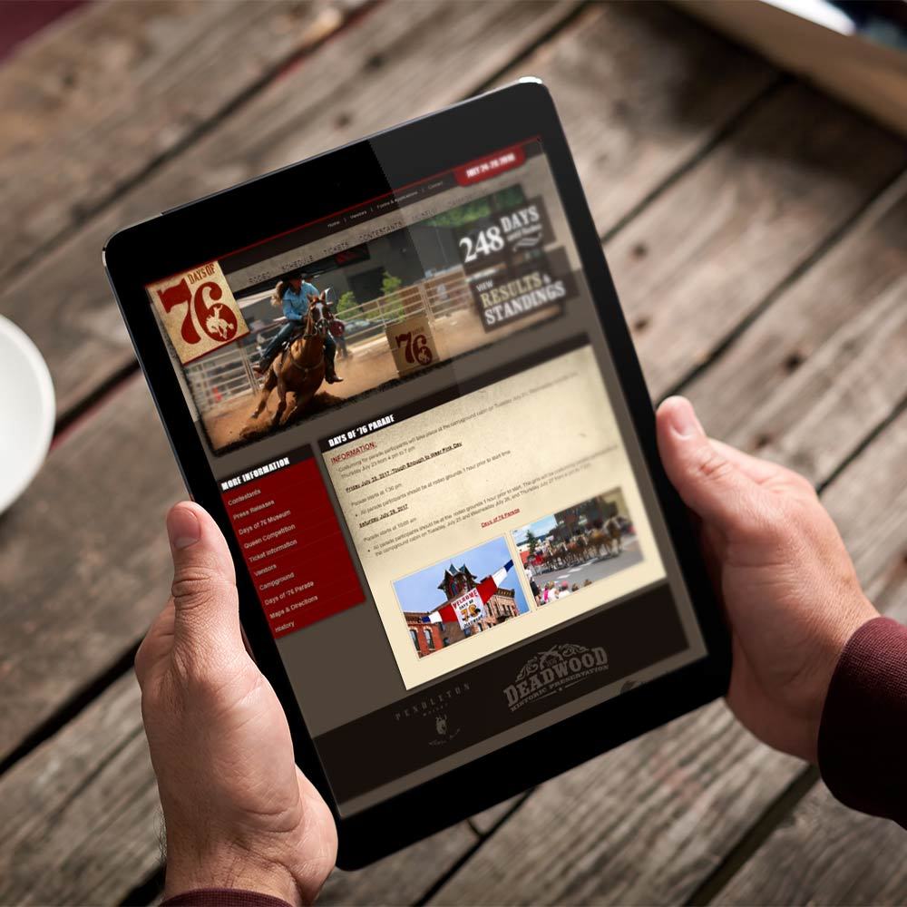 Days of 76 Rodeo website on tablet
