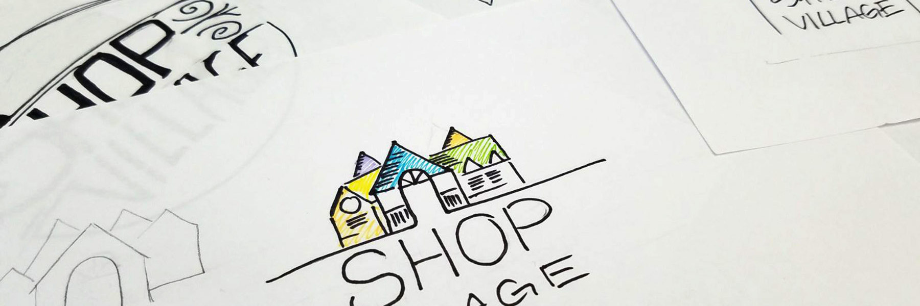 Shop Village Logo sketches